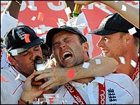 Trott (centre) celebrates with Swann and Flintoff