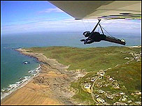 A wing tip view of Mike Stainer in full flight