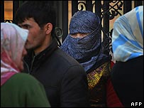An Uighur Muslim woman at a market in Urumqi