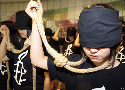 Amnesty International activists stage an anti-death penalty rally.