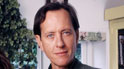 Simon Marchmont (Richard E Grant)