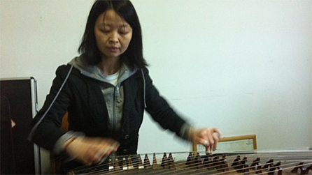 Jiang Qian playing the Guzheng