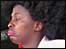 Redykulass in character as Lucy Kibaki