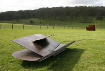 'Sunnyside Flats' 1974 Steel rusted & varnished. Sir Anthony Caro's 1970s steel sculptures were displayed at the New Art Centre Roche Court Wiltshire this summer.