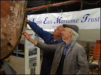 Dave and Peter looking at a boat