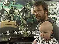 Nathan Wellard with his Banksy grafitti.