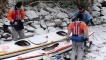 Carrying the kayaks through the snow.