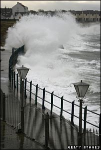 Waves lash the sea wall at Holyhead, Wales