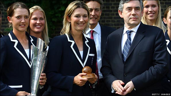 Charlotte Edwards holds the women's Ashes ball, Downing Street rose garden