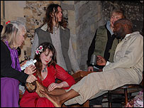 Mary of Magdala at Jesus' feet