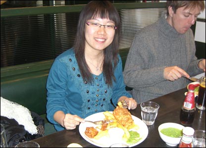 Han Hui eating fish and chips