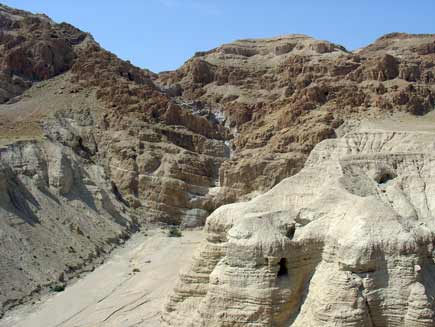 Stream bed, dry in the hot weather, running down a steep rocky incline