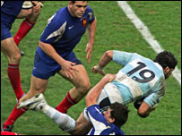 Leguizamon charges through the French defence