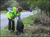 Diana Barnard picking up litter in Hollesley