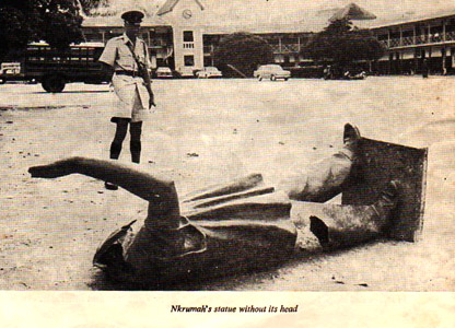 Upturned headless statue of Nkrumah