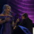 Lesley Garrett sings, while Maestro winner Sue Perkins, in the background, conducts the BBC Concert Orchestra