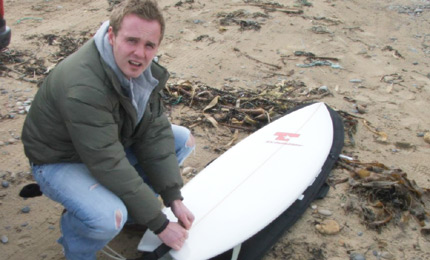 New fish. Conall waxes up his new 6 6' fish for a first session. Long may she shred. Pic: M, Mar 07
