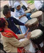 Kids drumming with Ruqia