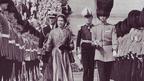 Queen Elizabeth II inspects a line of the Irish Guards at Stormont, Northern Ireland, in 1953 (Popperfoto/Getty Images)
