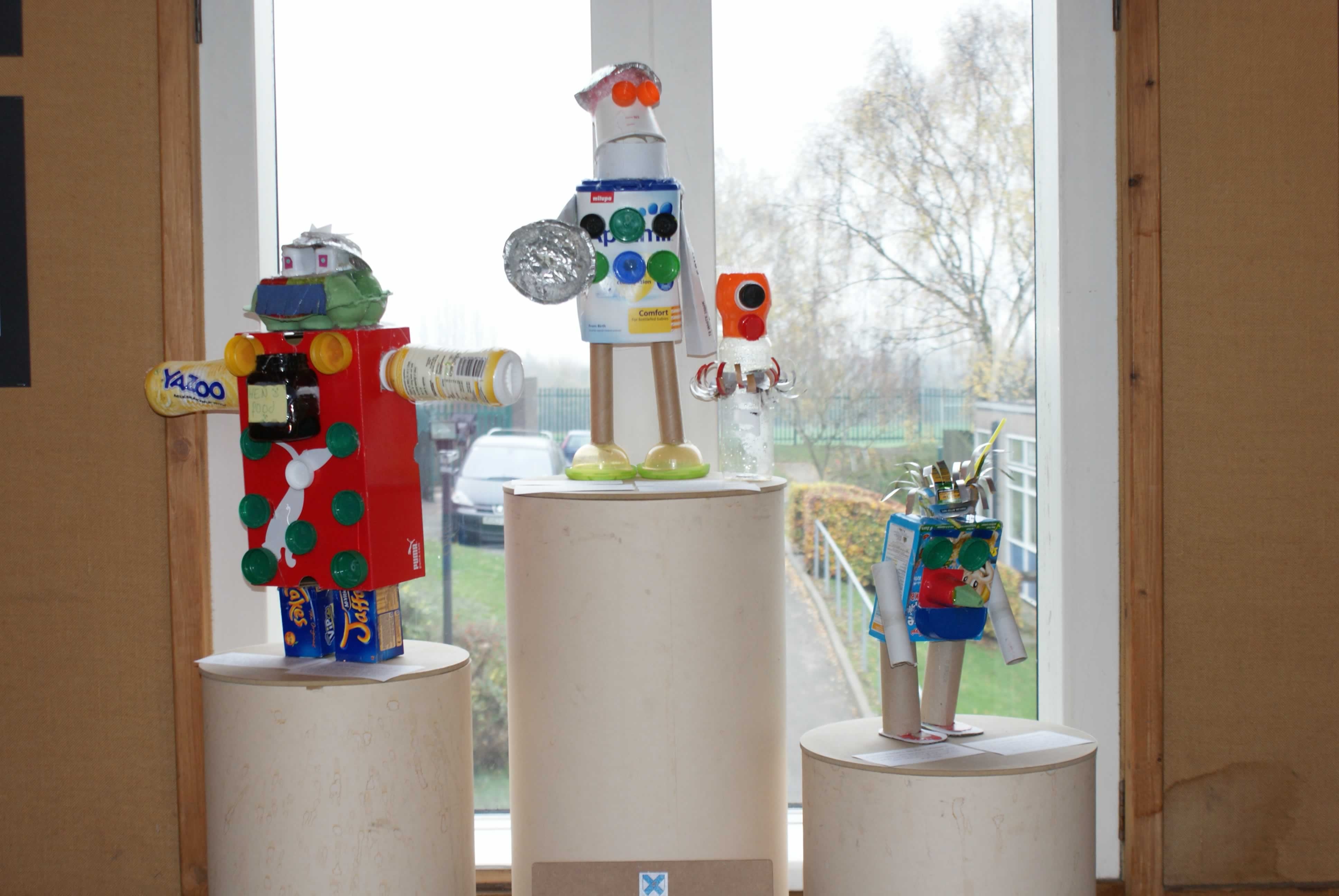 Three robots from the Rotherham school's art exhibition