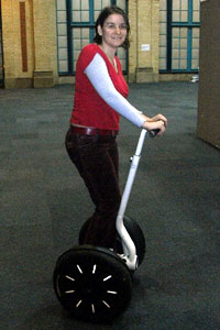 A side view of Kate on the Segway, showing the balance that's required