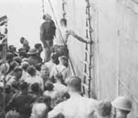 Photograph showing the men being rescued from the Lancastria