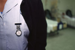 Picture shows detail of nurse's uniform