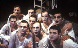 The cast waiting on Mark's review of their performance. 