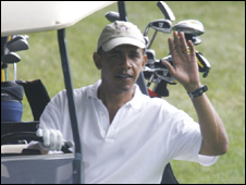 President Obama driving a golf buggy