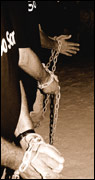 Men in chains
