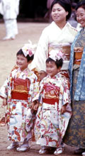 Three-year-old girls dressed up in kimonos
