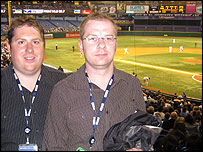 Seth Bennett and Paul Walker at a baseball game.