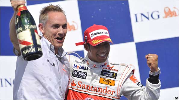 McLaren team boss Martin Whitmarsh and Lewis Hamilton celebrate their Hungary win