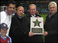 Phil Upton with members of the '82 team