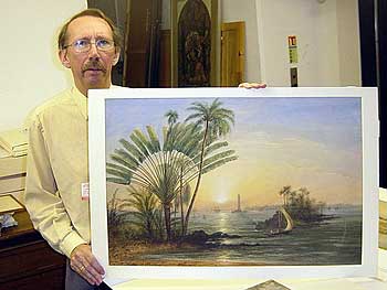 Martyn Anglesea of Ulster Museum holding painting of Galle Harbour, by Nicholl