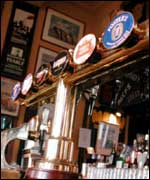 Beer pumps in a pub 