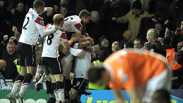 Scholes and Co celebrate a fantastic comeback to beat Blackpool 3-2