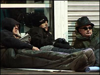 Men sleeping out