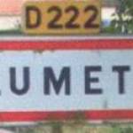 The entrance sign to Plumetot, Calvados, Normandy. This village was at the heart of the Allied aerodrome B10 during the Battle of Normandy in 1944