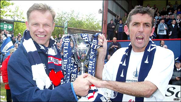 John Hughes and Owen Coyle, joint player-managers at Falkirk, celebrate winning the Scottish First Division in 2003