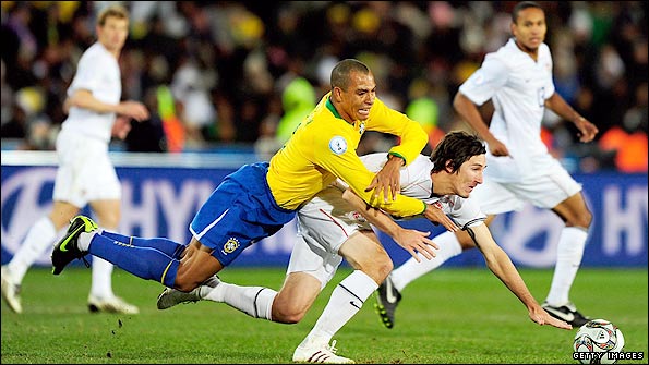 Brazil's Gilberto Silva takes on the US in the Confederations Cup Final 