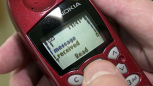 Mobile phone held in hands