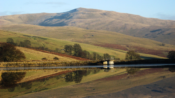 Hills reflected in a reservoir (Maria Nimmo)
