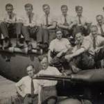 Fitters and armourers on Spitfire 19 in Aqubar