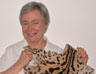 Kathleen McCann holding the skin of a civet her family brought to Britain with them from South Africa