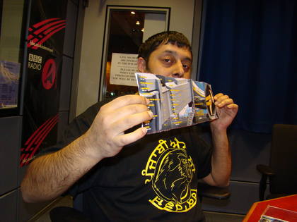 Panjabi MC showing off his new album cover