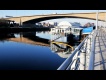 View of the Renfrew Ferry underneath the Kingston Bridge over the River Clyde, Glasgow.