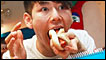 Man eating hot dog in a US hot dog eating contest 