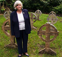 Ann Widdecombe at the grave of John Henry Newman