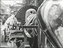 worker watching huge cams 